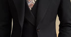 A three-piece black, light luxury, powerful British gentleman's suit for men