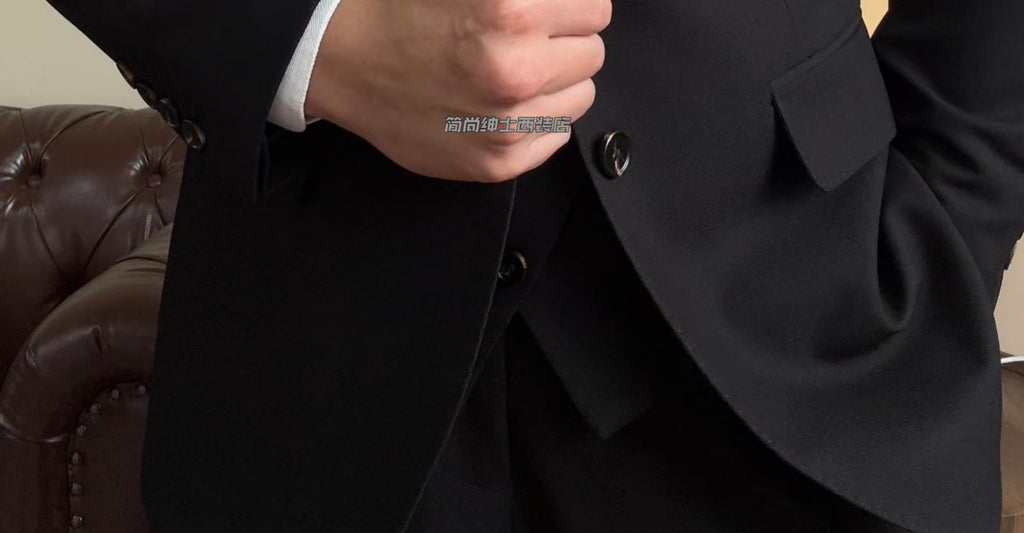 A three-piece black, light luxury, powerful British gentleman's suit for men