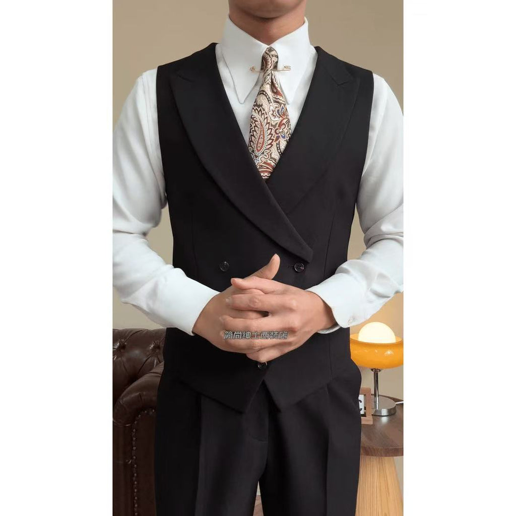 A three-piece black, light luxury, powerful British gentleman's suit for men