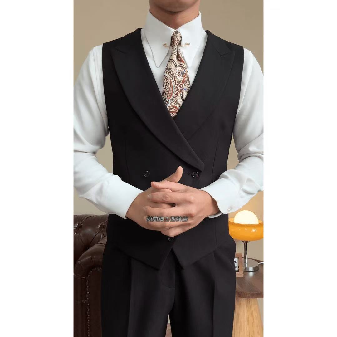 A three-piece black, light luxury, powerful British gentleman's suit for men