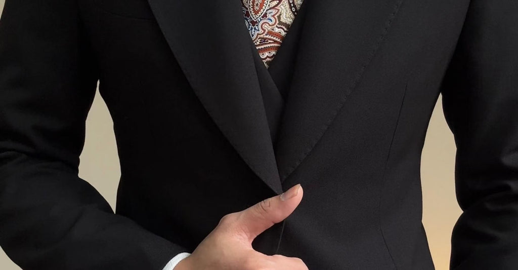 A three-piece black, light luxury, powerful British gentleman's suit for men