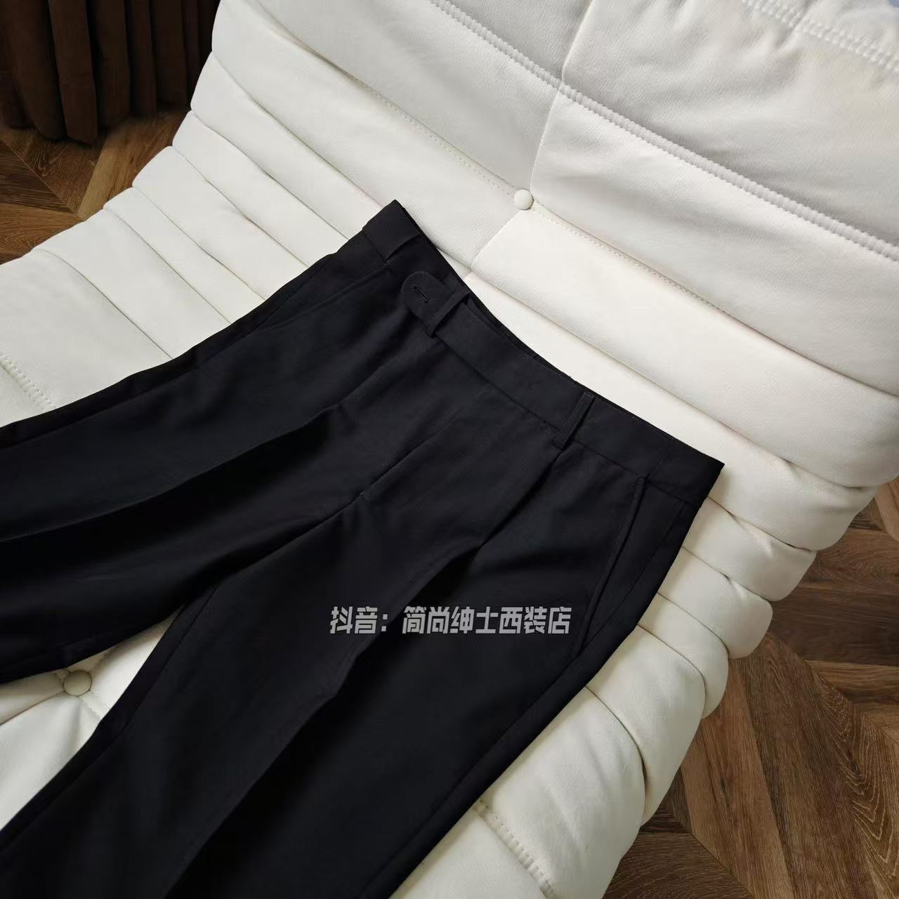 A three-piece black, light luxury, powerful British gentleman's suit for men