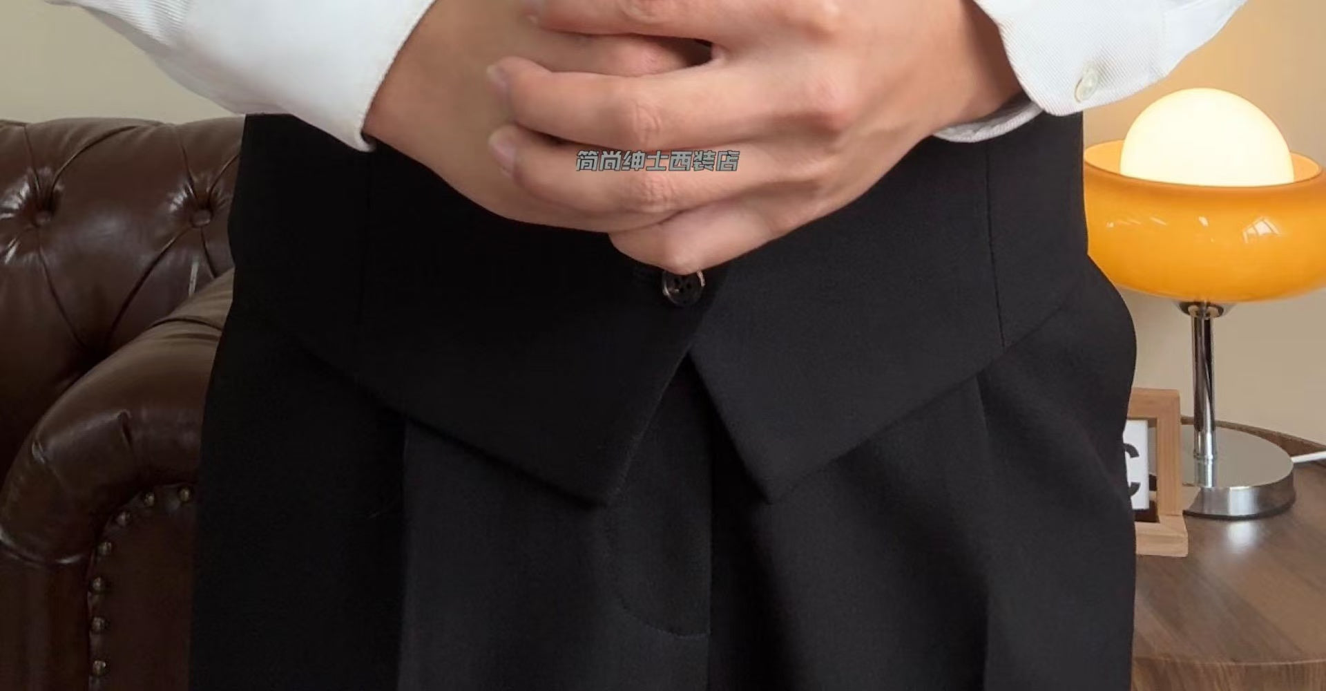 A three-piece black, light luxury, powerful British gentleman's suit for men