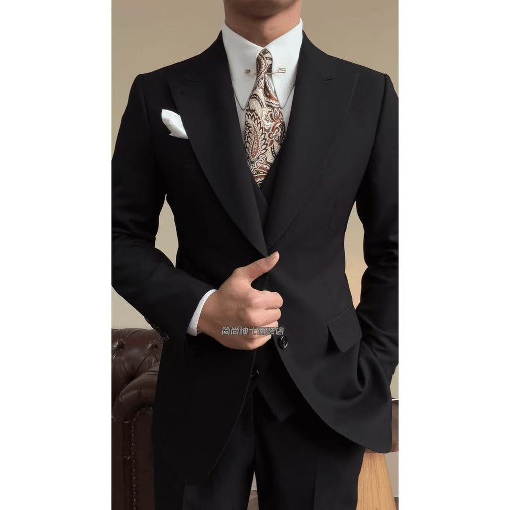 A three-piece black, light luxury, powerful British gentleman's suit for men