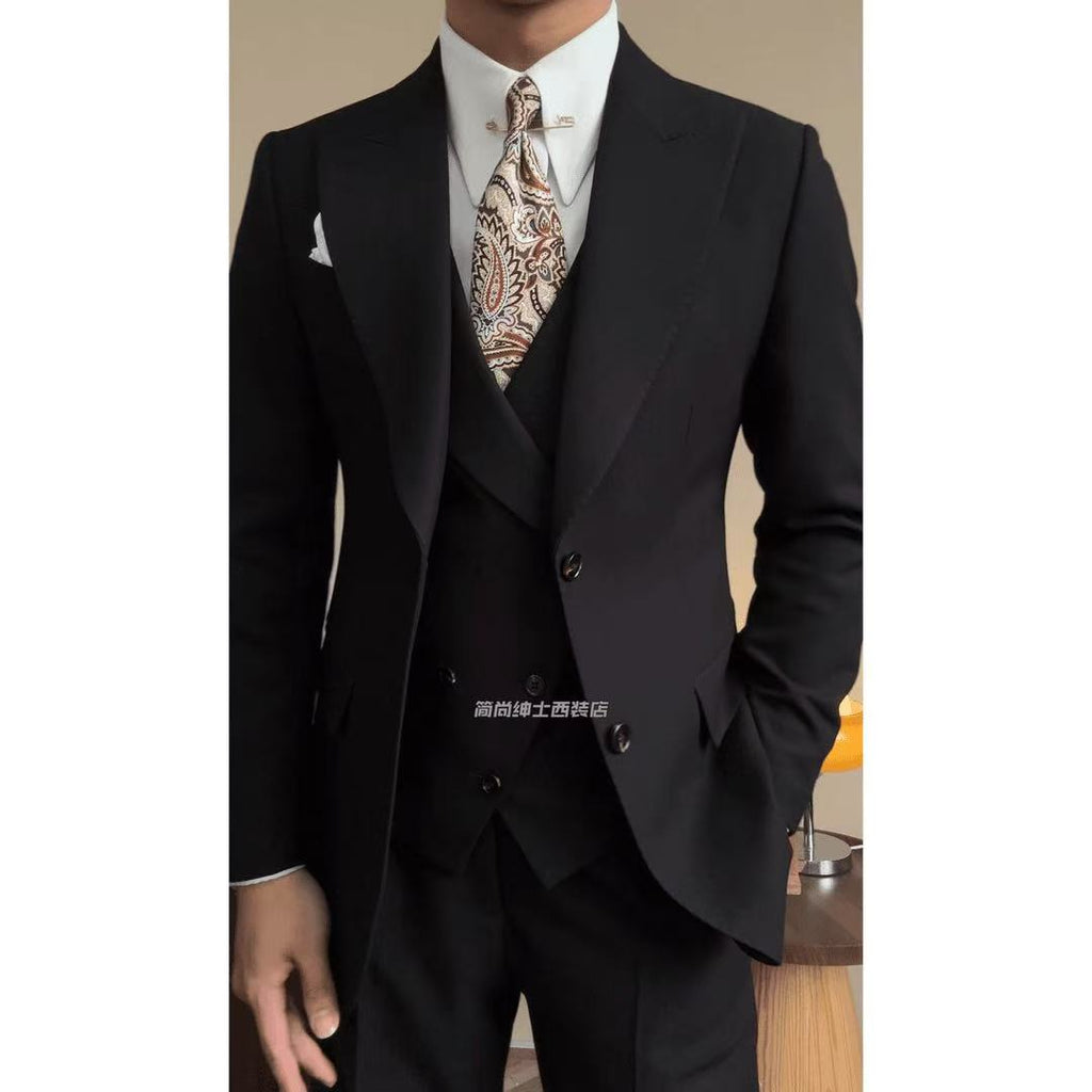A three-piece black, light luxury, powerful British gentleman's suit for men