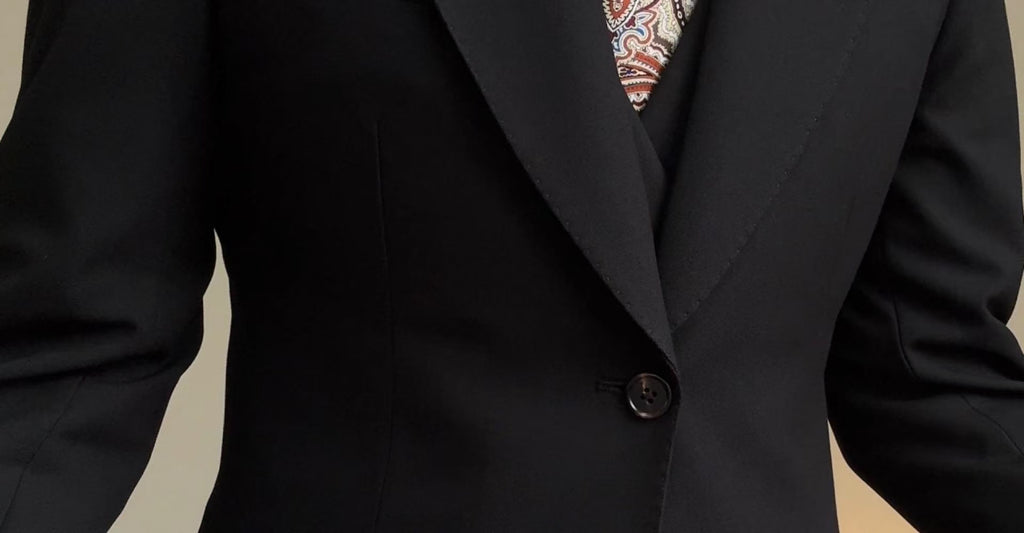 A three-piece black, light luxury, powerful British gentleman's suit for men