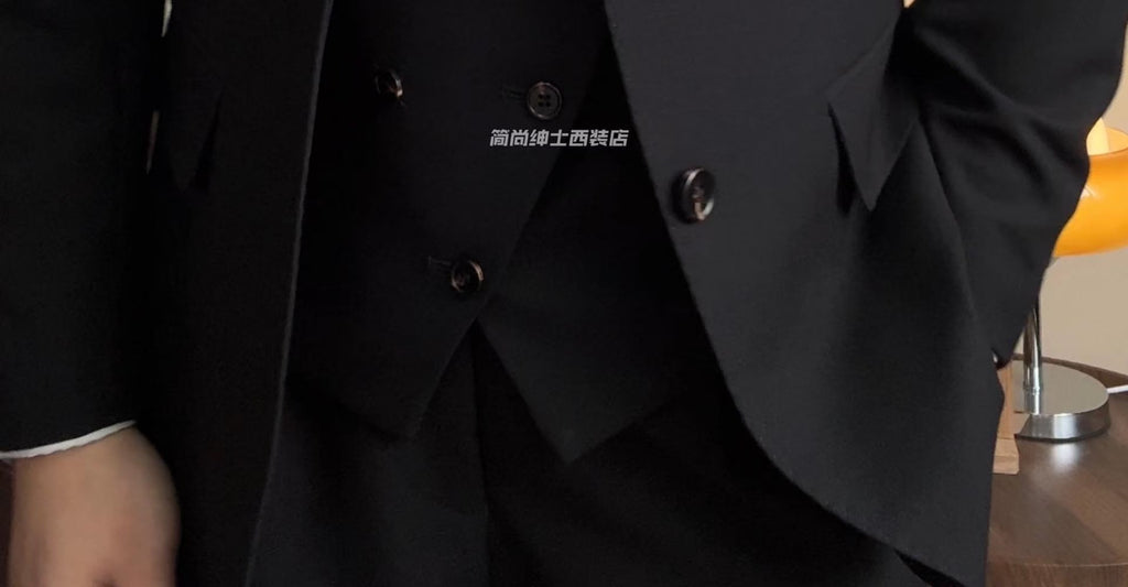 A three-piece black, light luxury, powerful British gentleman's suit for men