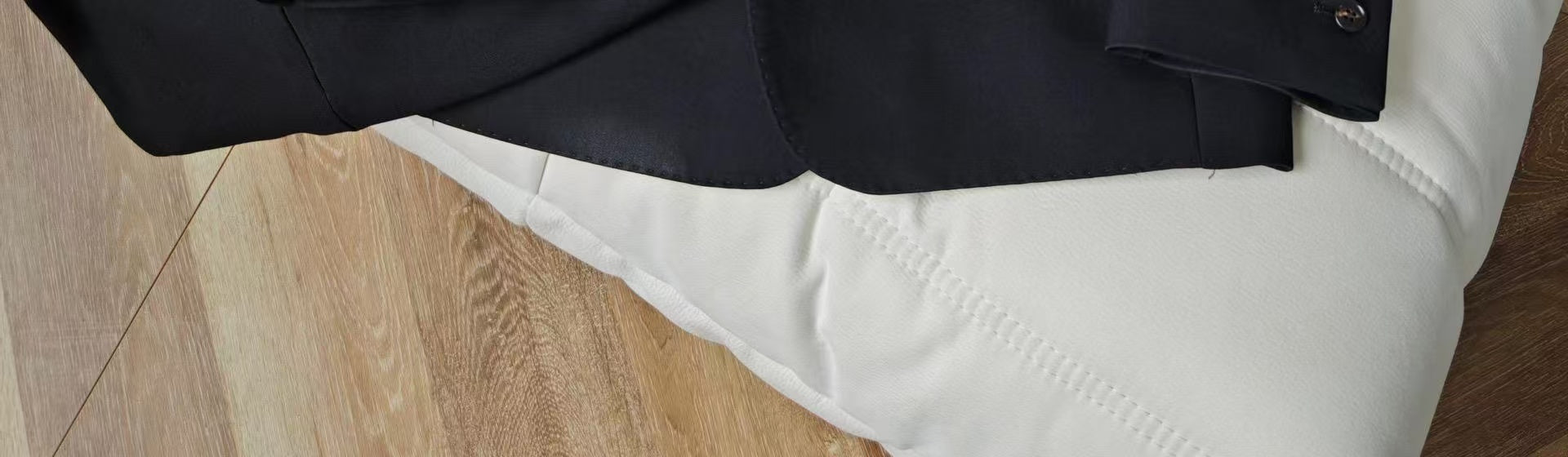 A three-piece black, light luxury, powerful British gentleman's suit for men