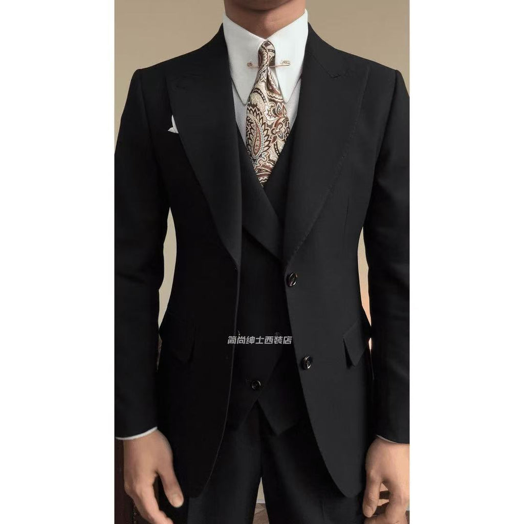 A three-piece black, light luxury, powerful British gentleman's suit for men