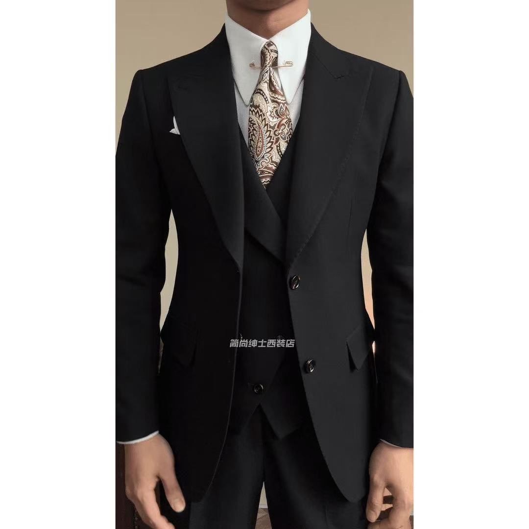 A three-piece black, light luxury, powerful British gentleman's suit for men